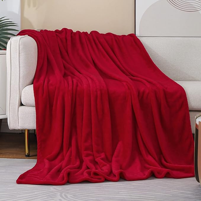 Luxurious burgundy faux fur flannel fleece throw blanket, warm and cozy, perfect for sofas or beds.