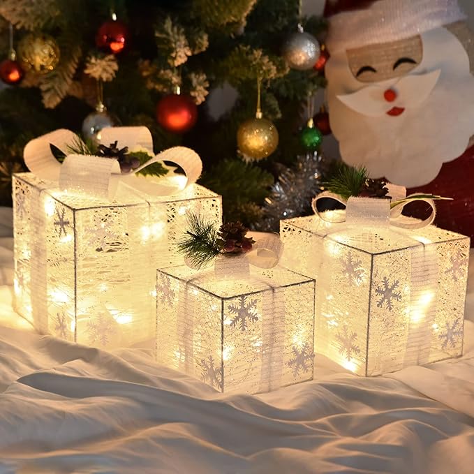 Lighted gift boxes set with warm white LED, perfect for Christmas decorations and indoor party ambiance.