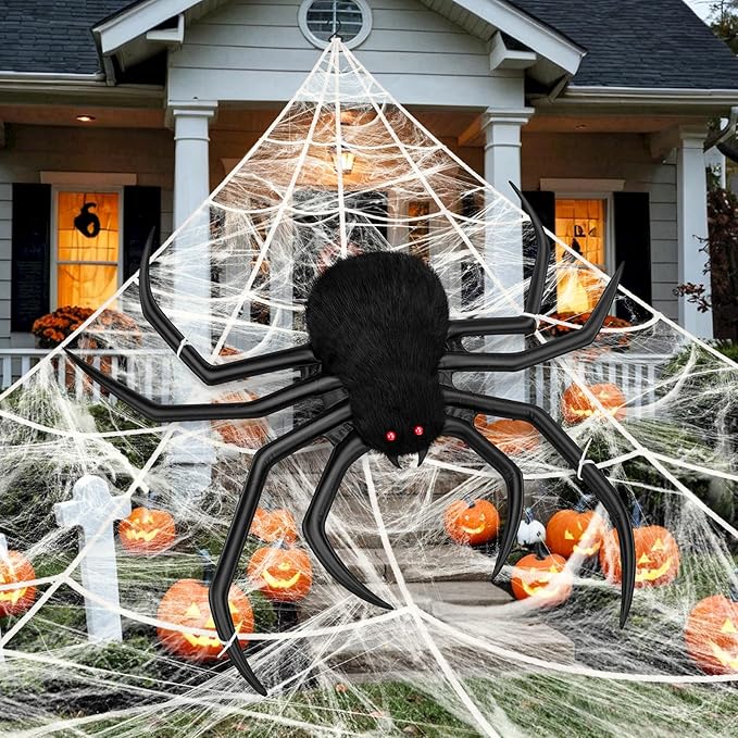 Giant inflatable spider with triangular spider web for Halloween decorations. Scary and spooky party props.