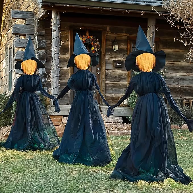 Halloween decorations featuring a set of three glowing witches with stakes for garden and outdoor decor.