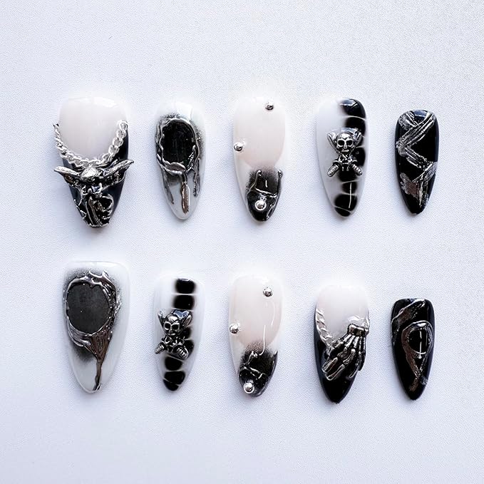 Luxury handcrafted Halloween press on nails with black French tips, 3D skull and angel design, full cover.